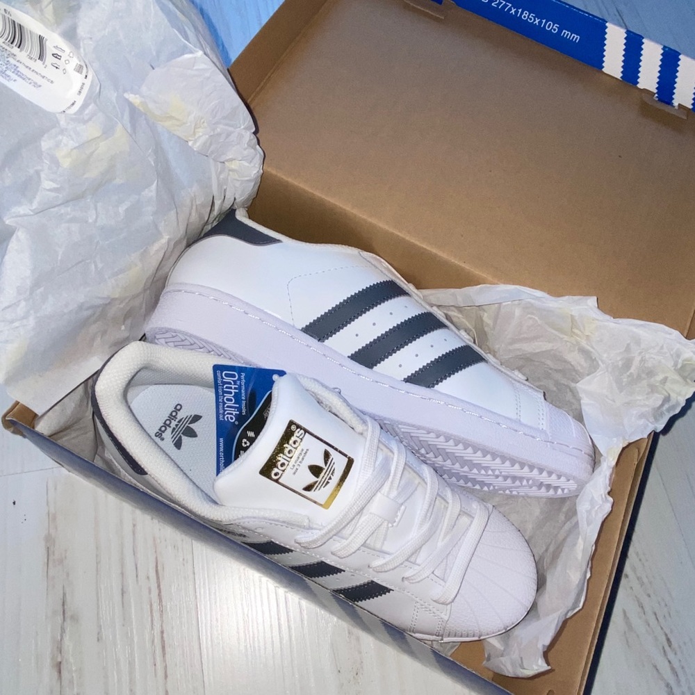 White and grey Adidas superstar sneaker
